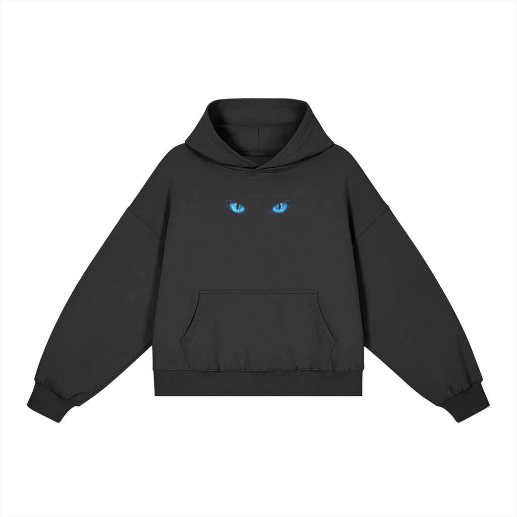 Piercing Blue Eyes black boxy hoodie with blue eyes at the upper chest